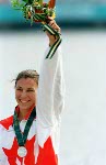 Canada's Caroline Brunet celebrates her silver medal win in the K-1 kayak event at the 1996 Atlanta Summer Olympic Games. (CP Photo/COA/Mike RIdewood)