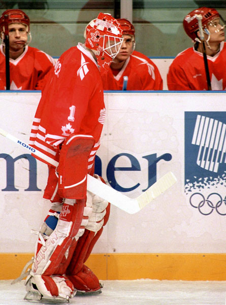 Canada's Corey Hirsch (1) participates in hockey action at the 1994 Winter Olympics in Lillehammer. (CP Photo/COA/Claus Andersen)