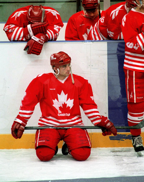 Canada's Todd Hlushko participates in hockey action at the 1994 Winter Olympics in Lillehammer. (CP Photo/COA/Claus Andersen)