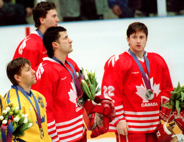 Team Canada celebrates their silver medal win in the hockey event at the 1994 Lillhammer Olympics. (CPP Photo/COA/F. Scott Grant)