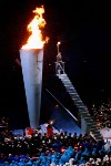 The Olympic Flame burns brightly above the crowd at the 1992 Olympic games in Barcelona. (CP PHOTO/ COA/ Claus Andersen)