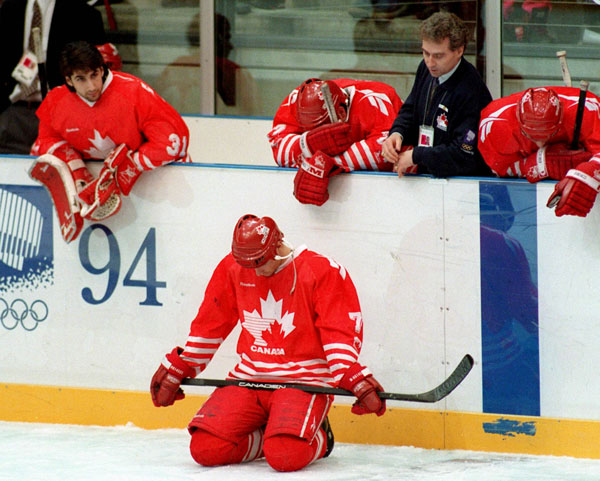 Canada's coach Tom Renney gives instructions during hockey action at the 1994 Winter Olympics in Lillehammer. (CP Photo/COA/Claus Andersen)