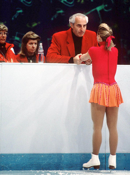 Canada's Jose Chouinard talks with her coach Louis Stong at the 1994 Lillehammer Winter Olympics. (CP PHOTO/ COA)