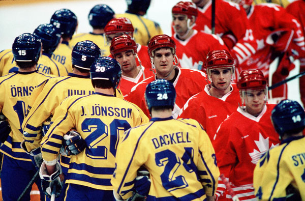 Team Canada and Team Sweden shake hands at the end of a hockey game at the 1994 Winter Olympics in Lillehammer. (CP Photo/COA/Claus Andersen)