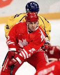 Canada's Chris Kontos competes in hockey action against Sweden at the 1994 Winter Olympics in Lillehammer. (CP Photo/COA/Claus Andersen)