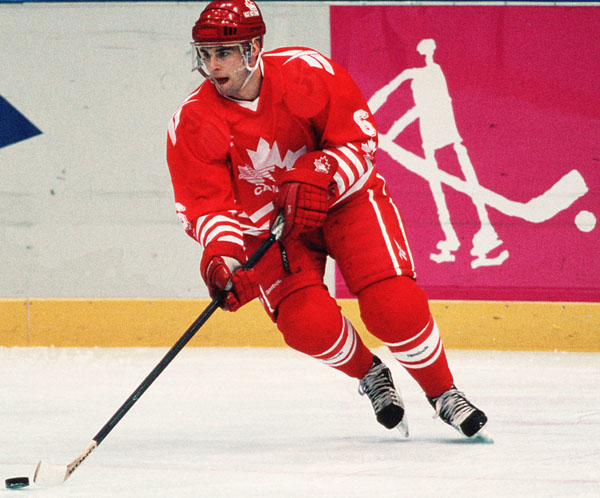 Canada's Ken Lovsin competes in hockey action at the 1994 Winter Olympics in Lillehammer. (CP Photo/COA/Claus Andersen)
