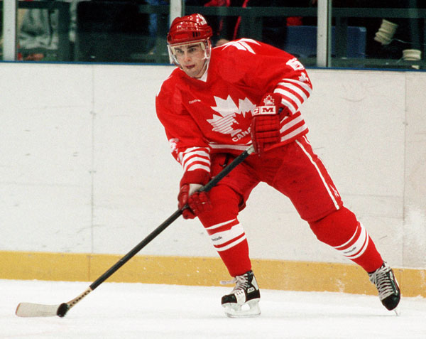 Canada's Ken Lovsin competes in hockey action at the 1994 Winter Olympics in Lillehammer. (CP Photo/COA/Claus Andersen)