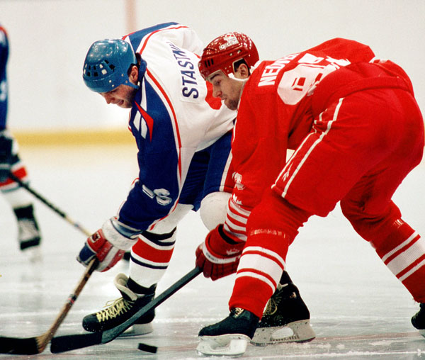 Canada's Petr Nedved (right) competes in hockey action against Slovakia at the 1994 Winter Olympics in Lillehammer. (CP Photo/COA/Claus Andersen)