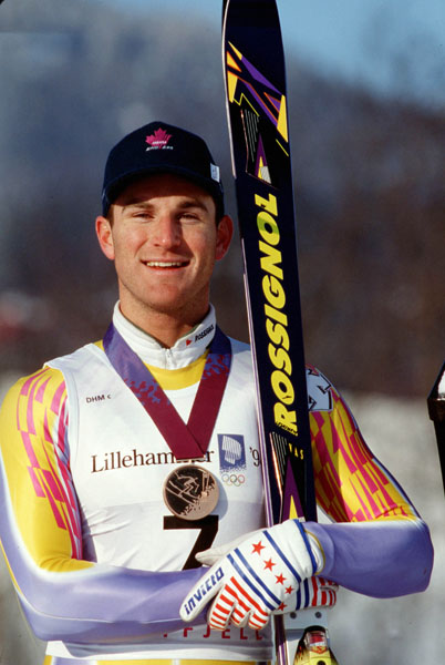 Canada's Edi Podivinski shows off the bronze medal he won in the men's downhill ski event at the 1994 Lillehammer Winter Olympics. (CP Photo/COA/Claus Andersen)