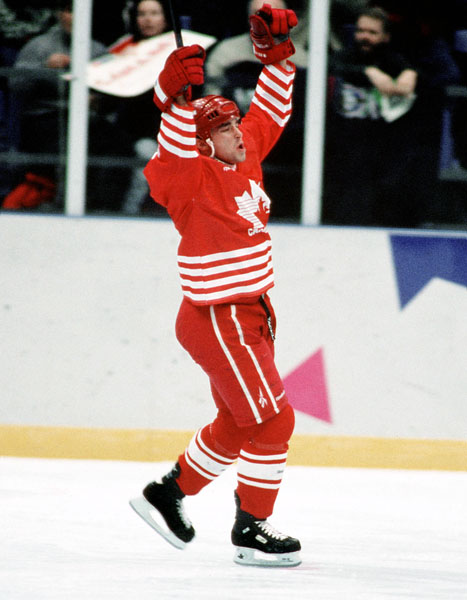 Canada's Todd Hlushko competes in hockey action at the 1994 Winter Olympics in Lillehammer. (CP Photo/COA/Claus Andersen)