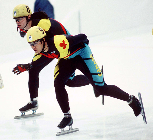 Canada's Derek Campbell (9) and Frederic Blackburn compete in the speed skating event at the 1994 Lillehammer Winter Olympics. (CP Photo/ COA/F. Scott Grant)