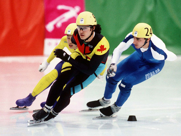 Canada's Derek Campbell (in front) competes in the short track speed skating event at the 1994 Lillehammer Winter Olympics. (CP Photo/ COA/F. Scott Grant)