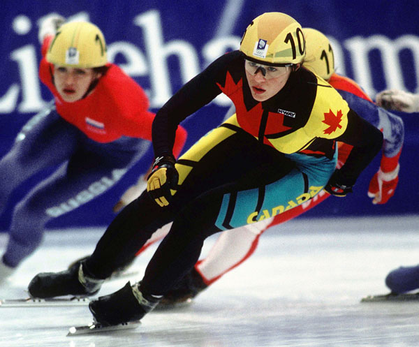 Canada's Isabelle Charest (10 ) competes in the short track speed skating event at the 1994 Lillehammer Winter Olympics. (CP Photo/ COA/F. Scott Grant)