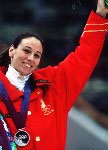 L'quipe fminine de relais en patinage de vitesse courte piste du Canada, Isabelle Charest, Sylvie Daigle, Christine Boudrias et Nathalie Lambert, clbre sa mdaille d'argent remporte aux Jeux olympiques d'hiver de Lillehammer de 1994. (Photo PC/AOC)