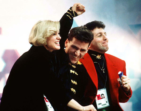 Canada's Elvis Stojko and his coach Doug Leigh celebrate his score at the 1994 Lillehammer Winter Olympics. (CP Photo/COA/F. Scott Grant)