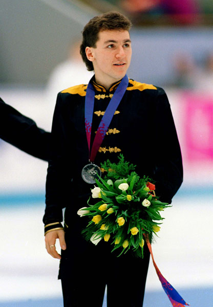 Canada's Elvis Stojko celebrates his silver medal in the men's figure skating event at the 1994 Lillehammer Winter Olympics. (CP Photo/COA/F. Scott Grant)