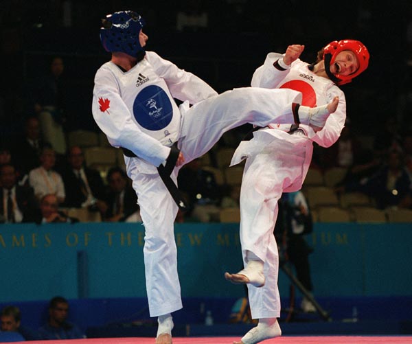 Canada's Dominique Bosshart competes in the taekwondo portion of the Sydney 2000 Olympic Games(CP PHOTO/ COA)