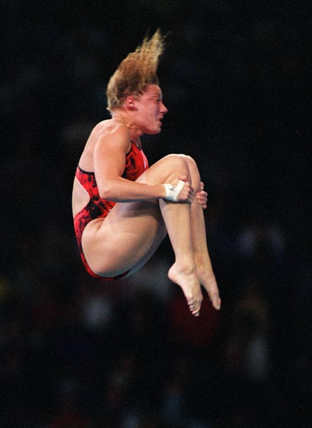 Canada's Emilie Heymans floats in mid-air as she performs a dive at the Sydney 2000 Olympic Games(CP PHOTO/ COA)
