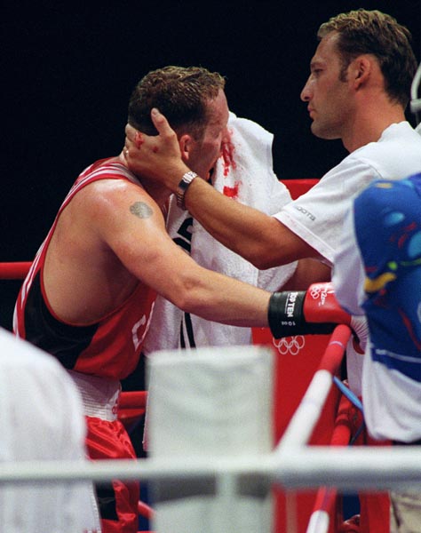 Canada's Donald Orr with his trainer at the 2000 Sydney Olympic Games. (CP Photo/ COA)