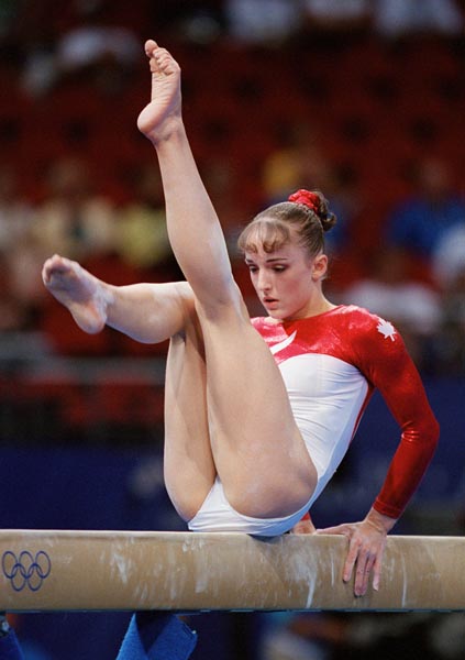 Canada's Lise Leveille performs her balance beam routine at the 2000 Sydney Olympic Games. (CP Photo/ COA)