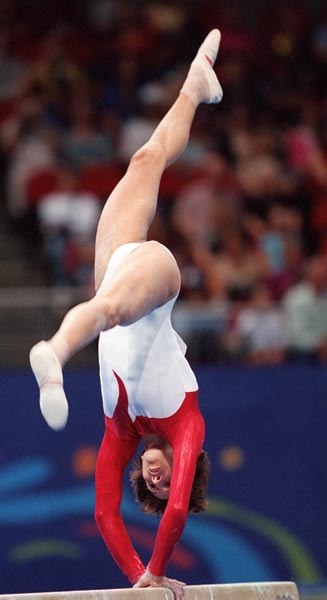 Canada's Yvonne Tousek performs her balance beam routine at the 2000 Sydney Olympic Games. (CP Photo/ COA)