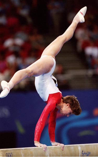 Canada's Yvonne Tousek performs her balance beam routine at the 2000 Sydney Olympic Games. (CP Photo/ COA)