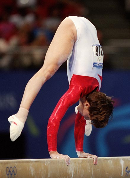 Canada's Yvbonne Tousek performs her balance beam routine  at the 2000 Sydney Olympic Games. (CP Photo/ COA)