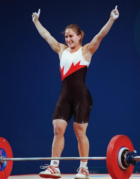 Canada's Maryse Turcotte lifts during the women's 58 kg weightlifting competition at the Sydney Olympic Games on Monday September 18, 2000. (CP Photo/COA)