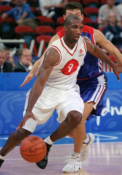 Canada's Rowan Barrett playing offence at the 2000 Sydney Olympic Games. (CP Photo/ COA)