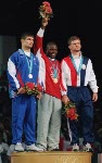 Canada's Daniel Igali celebrates his gold medal win in the wrestling event at the 2000  Sydney Olympic Games. (CP PHOTO/ COA)