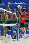 John Child du Canada participe  une preuve de volleyball de plage aux Jeux olympiques de Sydney de 2000. (Photo PC/AOC)