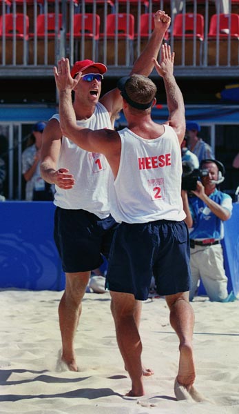 Canada's Mark Heese (right)  and John Child (left)   in action during a beach volleyball tournament  at the Sydney 2000 Olympic Games. (CP PHOTO/ COA)