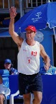 Canada's John Child competes in the beach volleyball event at the 2000 Sydney Olympic Games on September 22,2000.(CP Photo/COA)