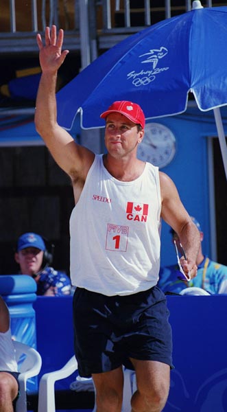 Canada's John Child competes in the beach volleyball event at the 2000 Sydney Olympic Games on September 22,2000.(CP Photo/COA)