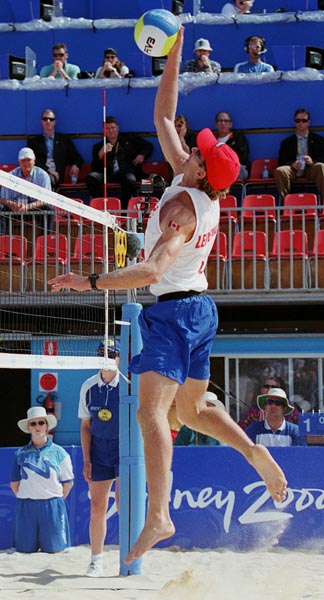 Canada's  Conrad Leinemann  competes in the beach volleyball event at the 2000 Sydney Olympic Games on September 22, 2000. (CP Photo/ COA)