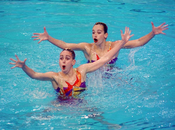 Canada's Fanny Letourneau and Claire Carver-Dias perform their duo synchronized swimming routine at the 2000 Sydney Olympic Games. (CP Photo/ COA)