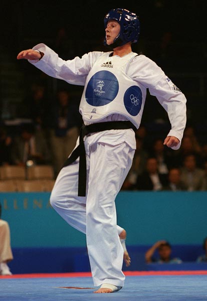 Canada's Dominique Bosshart competes in the taekwondo portion of the 2000 Sydney Olympic Games. (Mike Ridewodd/CP Photo/ COA)
