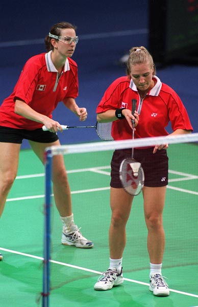Canada's Robbyn Hermitage (L) and Milaine Cloutier play a set of women's doubles badminton  at the 2000 Sydney Olympic Games. (Mike Ridewood/CP Photo/ COA)