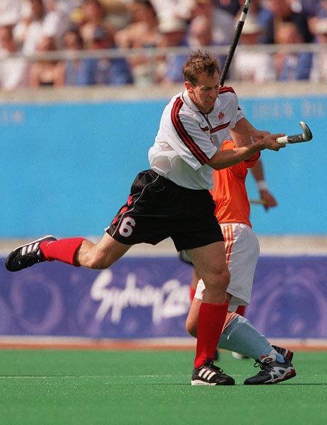 Canada's Chris Gifford playing field hockey at the 2000 Sydney Olympic Games. (CP Photo/ COA)
