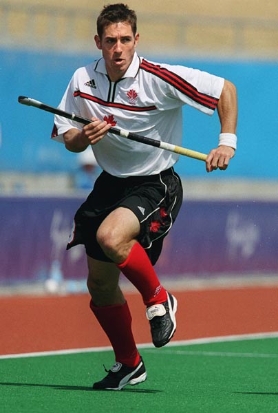 Canada's Andrew Griffiths playing field hockey at the 2000 Sydney Olympic Games. (CP Photo/ COA)