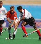Canada's Ken Pereira (9) plays field hockey at the 2000 Sydney Olympic Games. (CP Photo/ COA)