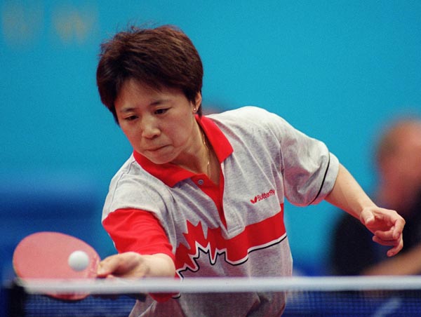 Canada's Lijuan Geng playing table tennis at the 2000 Sydney Olympic Games. ( Mike Ridewood/CP Photo/ COA)