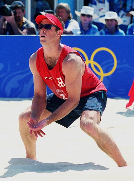 Canada's Mark Heese plays a set of beach volleyball  at the 2000 Sydney Olympic Games. (CP Photo/ COA)