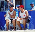 Canada's John Child and Mark Heese get excited after winning a round of beach volleyball at the 2000 Sydney Olympic Games. (CP Photo/ COA)