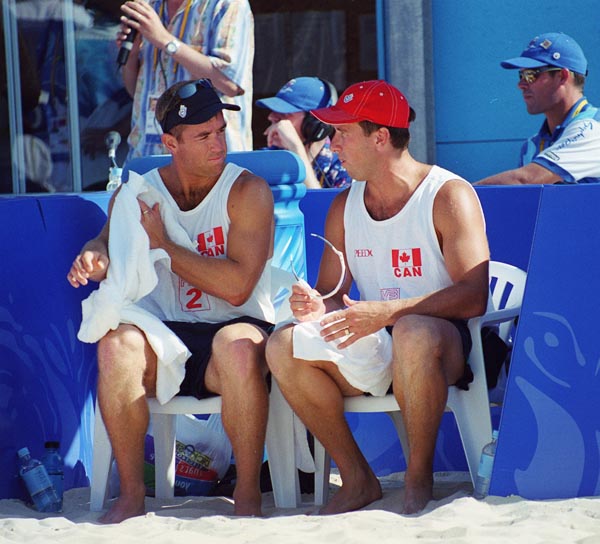 Canada's Mark Heese (left) and John Child (right) take a break from competition at the 2000 Sydney Olympic Games on September 22, 2000. (CP Photo/COA)