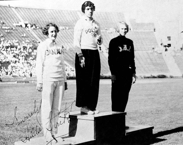Canada's Hilda Strike (left) celebrates her silver medal win in the women's 100m race at the 1932 Los Angeles Olympics. (CP Photo/COA)