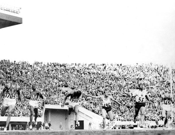 Canada's Harry Jerome (56) competes in an atheltics event at the 1964 Tokyo Olympics. (CP Photo/COA)