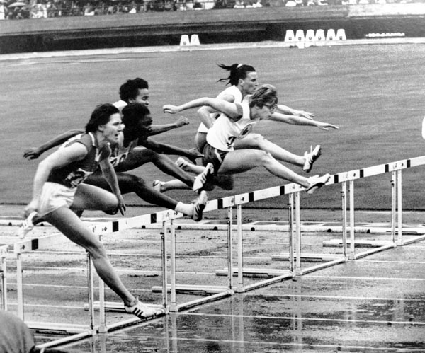 Canada's Marion Snider (right foreground) competes in an athletics event at the 1964 Tokyo Olympics. (CP Photo/COA)