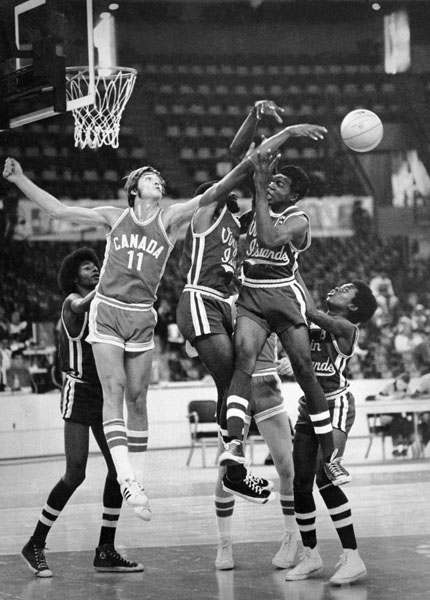 Canada's James Russell (11) competes in basketball action at the 1976 Montreal  Olympic Games. (CP Photo/COA/BB)