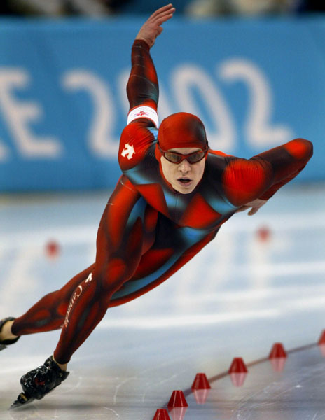 Canadian long-track speed skater Mike Ireland of Winnipeg races during his 500-metre heat in Salt Lake City, Utah Tuesday Feb. 12, at the 2002 Winter Olympic Games. (CP Photo/COA/Andre Forget)